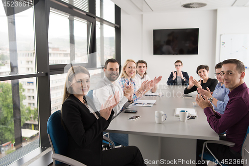 Image of Group of young people meeting in startup office