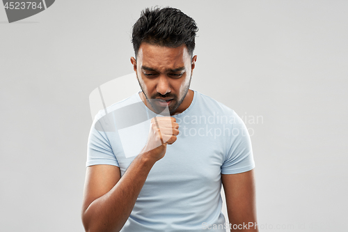 Image of unhealthy indian man coughing