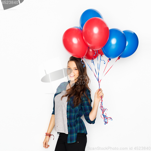 Image of happy teenage girl with helium balloons