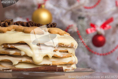 Image of Homemade cake with condensed milk, on the background of the Christmas tree