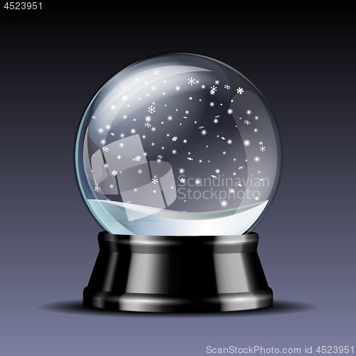 Image of Snow globe with falling snowflakes.