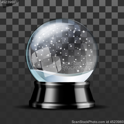 Image of Snow globe with falling snowflakes.