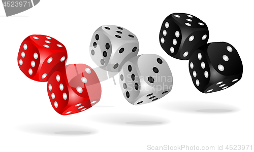 Image of Set of falling dice isolated on white.