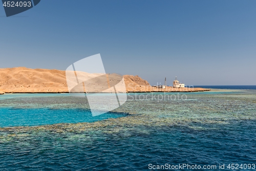 Image of Small island with coral reef