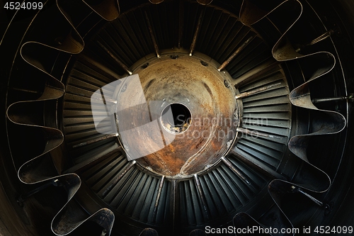 Image of Rusty old jet engine closeup as background