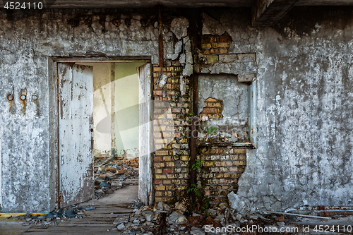 Image of Abandoned damaged building wall