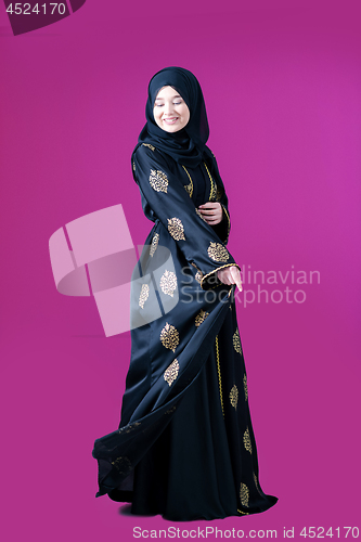 Image of muslum woman with hijab in modern dress