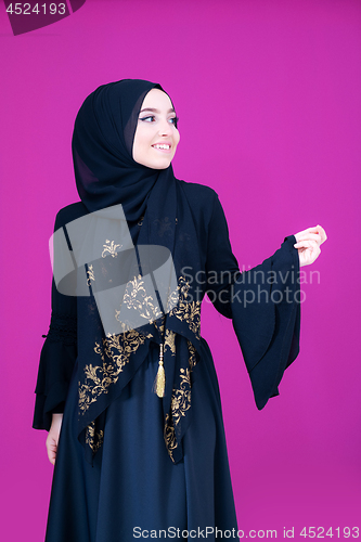 Image of muslum woman with hijab in modern dress