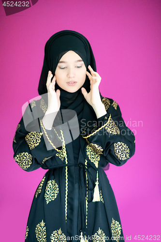 Image of muslum woman with hijab in modern dress