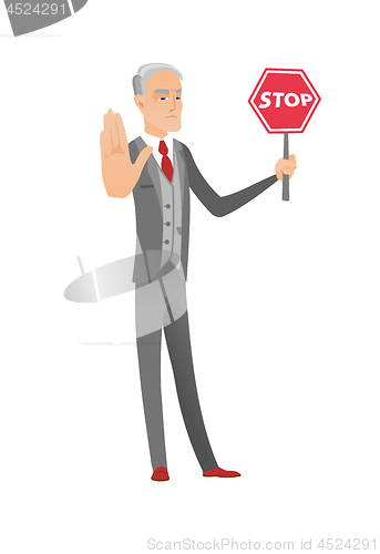 Image of Caucasian businessman holding stop road sign.