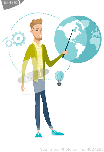 Image of Young caucasian businessman pointing at a globe.