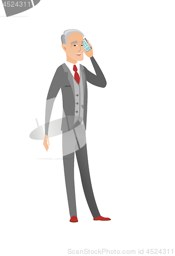 Image of Caucasian businessman talking on a mobile phone.