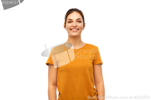 Image of young woman or teenage girl in orange t-shirt