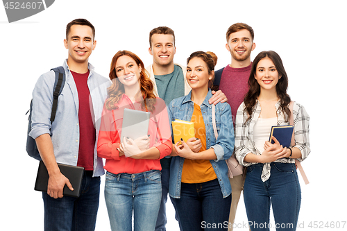 Image of group of smiling students with books