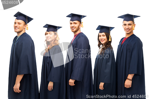 Image of graduates in mortar boards and bachelor gowns