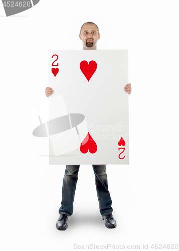 Image of Businessman with large playing card