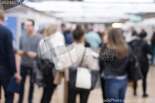 Image of Blured image of businesspeople socializing and networking during coffee break at conference meeting.