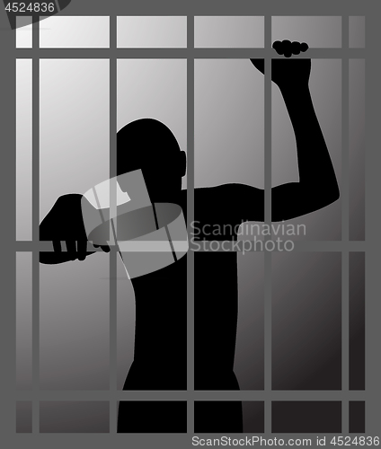 Image of Man in dark dungeon or prison behind bars
