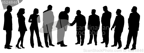 Image of Business people group at a meeting shaking hands