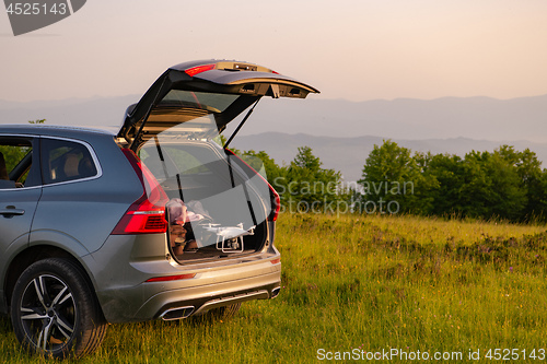 Image of drone ready for fly in suv trunk l