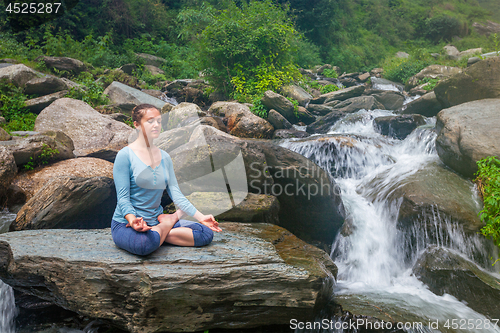 Image of Woman in Padmasana outdoors