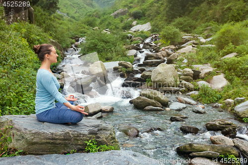 Image of Woman in Padmasana outdoors