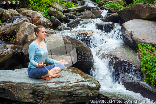 Image of Woman in Padmasana outdoors