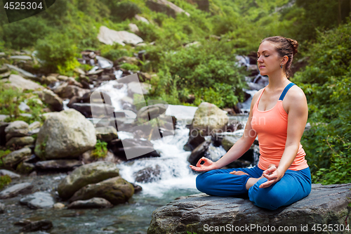 Image of Woman in Padmasana outdoors