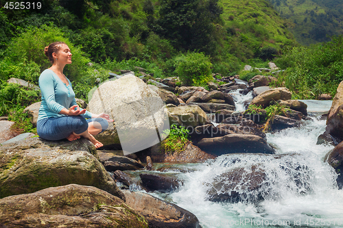 Image of Woman in Padmasana outdoors