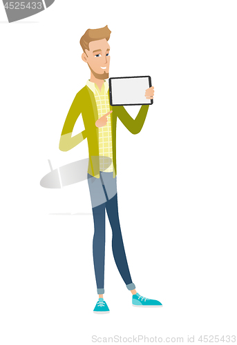 Image of Caucasian businessman holding tablet computer.