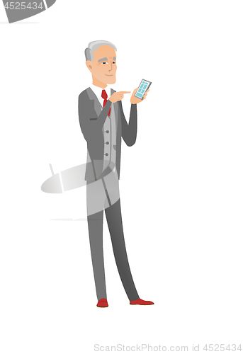 Image of Senior caucasian businessman holding mobile phone.