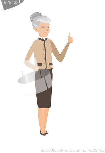 Image of Senior caucasian business woman giving thumb up