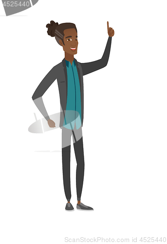 Image of African businessman pointing his forefinger up.