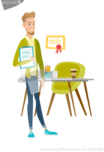 Image of Businessman holding clipboard with documents.