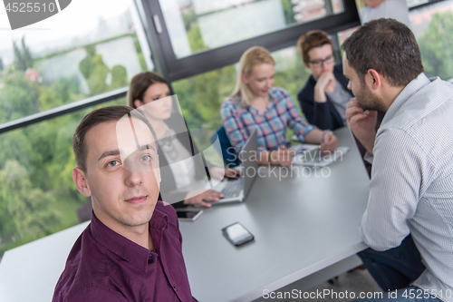 Image of Group of young people meeting in startup office