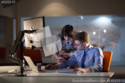 Image of young designers in the night office