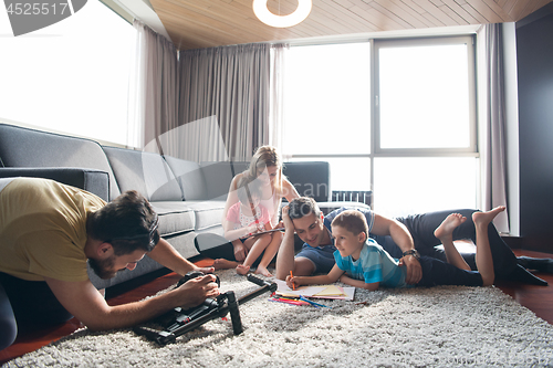 Image of young couple spending time with kids