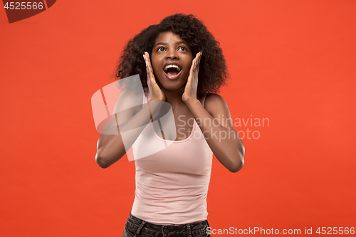 Image of Beautiful woman looking suprised