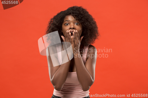 Image of Beautiful woman looking suprised