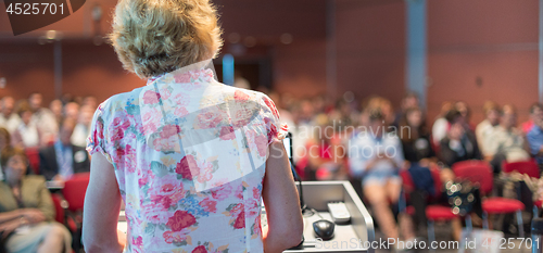 Image of Female academic professor lecturing.