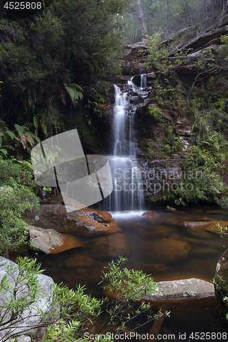 Image of Bushland oasis with pretty waterfall tumbling into rock pool