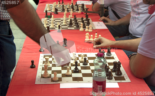 Image of Simultaneous chess competition organized on the city square