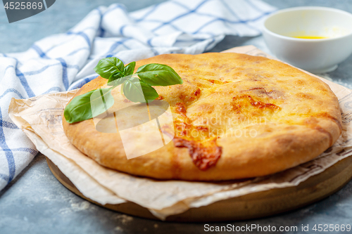 Image of Traditional Georgian closed pie with cheese.