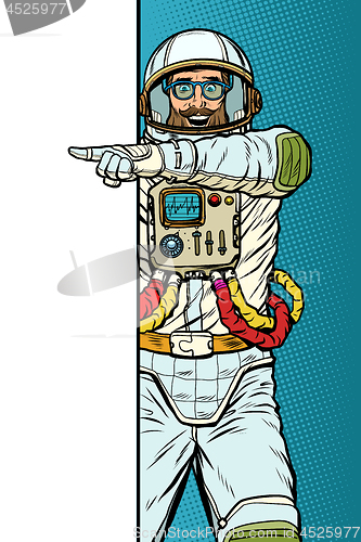 Image of man astronaut. Point to copy space poster