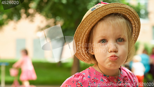 Image of Portrait of a sad little girl