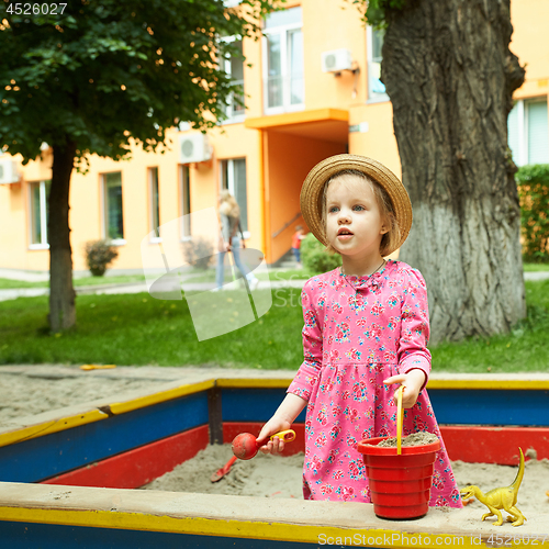 Image of Child on playground in summer park