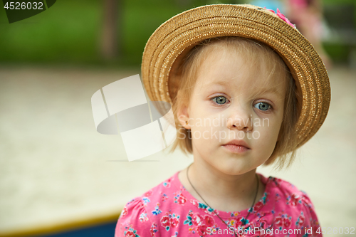 Image of Portrait of a sad little girl