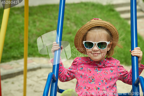 Image of Fashion portrait of girl child. Sunglasses.