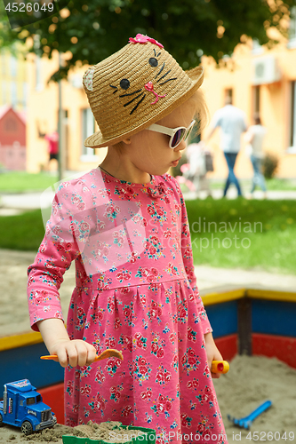 Image of The child on playground in summer park