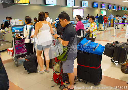 Image of Queue at airport check-in counter